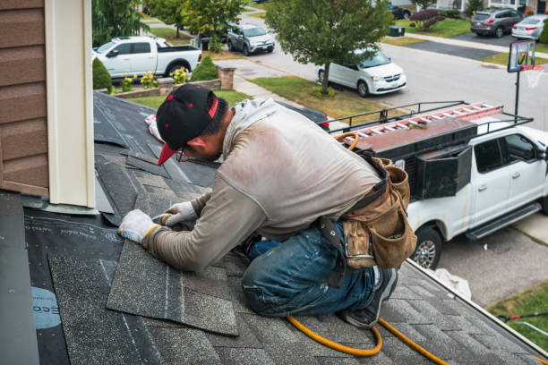 Professional Roofing technician working in Pineland, FL
